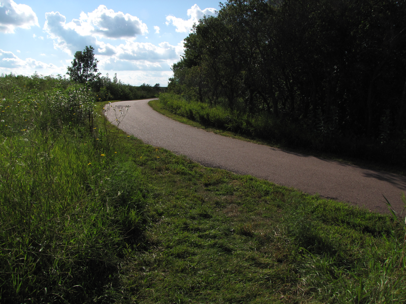Go straight onto paved path to parking lot