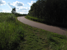 Go straight onto paved path to parking lot