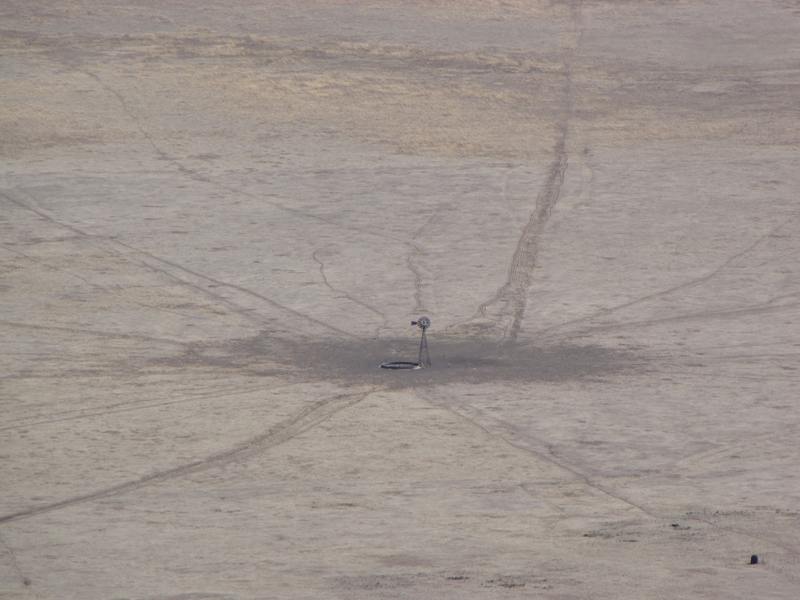 Windmill out in the desert