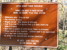 Trailhead warnings sign