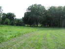 Cross the meadow towards the river