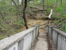 At the end of the bridge, go left into the gorge