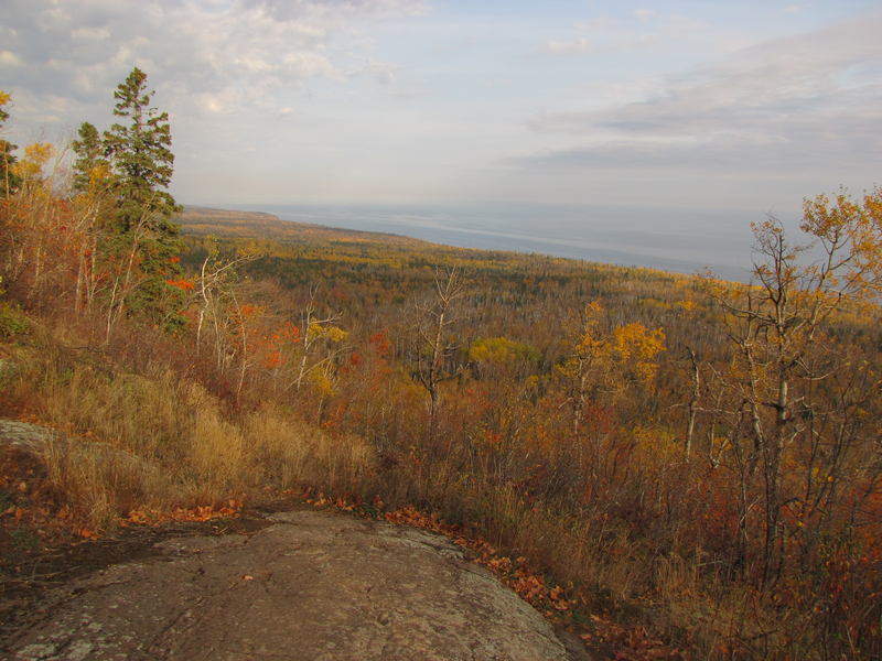 Long view of the lake from the top of a cliff