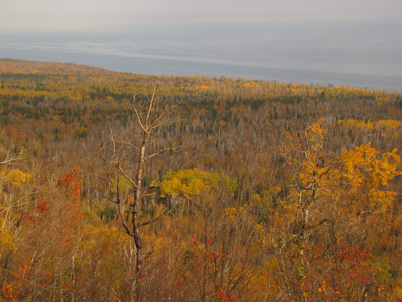 Long view of the lake from the top of a cliff